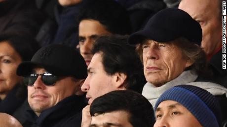 Actor Leonardo DiCaprio (sunglasses) and singer Mick Jagger (right) watched PSG beat Liverpool in the Champions League. 