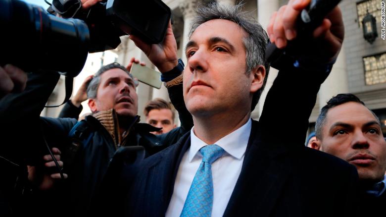 Michael Cohen walks out of federal court, Thursday, Nov. 29, 2018, in New York. Cohen, President Donald Trump's former lawyer,  pleaded guilty to lying to Congress about work he did on an aborted project to build a Trump Tower in Russia. He told the judge he lied about the timing of the negotiations and other details to be consistent with Trump's "political message." (AP Photo/Julie Jacobson)