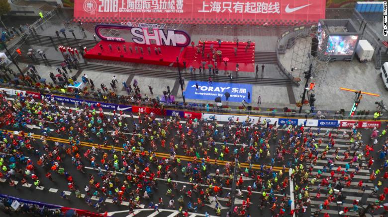 Marathons are increasingly common and popular in China. Runners in this photo take part in the Shanghai International Marathon in Shanghai on November 18.