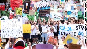 Thousands of students gathered a Martin Place in central Sydney armed with signs.