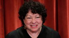 U.S. Supreme Court Associate Justice Sonia Sotomayor smiles during a group portrait session for the new full court at the Supreme Court in Washington, U.S., November 30, 2018. REUTERS/Jim Young