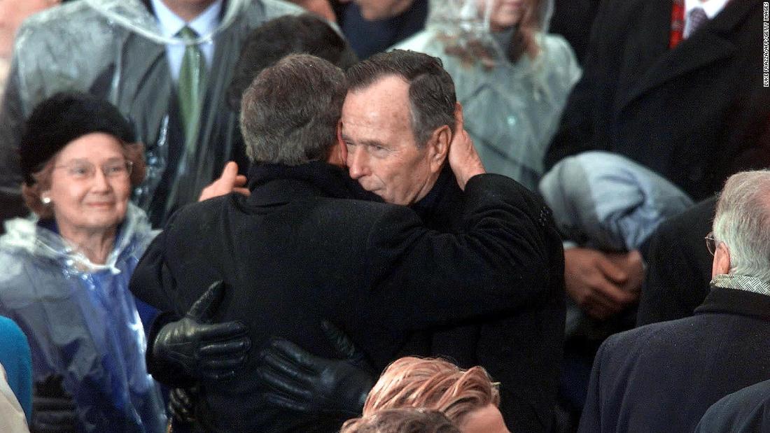 Bush&#39;s eldest son, George Walker Bush, was elected President in 2000. They became the second father-son duo in history to hold the office (the first being John Adams and John Quincy Adams). The two Georges hug here moments after the youngest was sworn in on January 20, 2001.