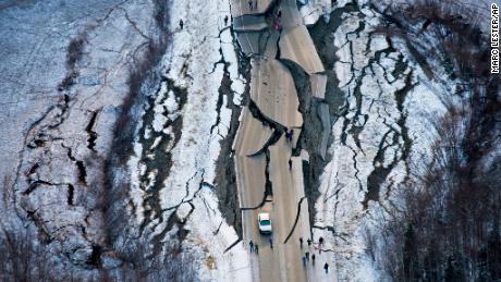 This aerial photo shows damage on Vine Road, south of Wasilla, Alaska, after earthquakes 
