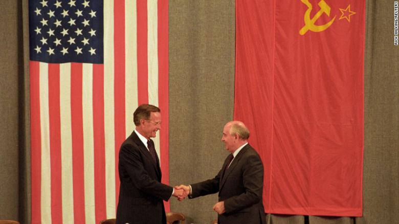 US President George H. W. Bush and Soviet President Mikhail Gorbachev shake hands in July 1991.