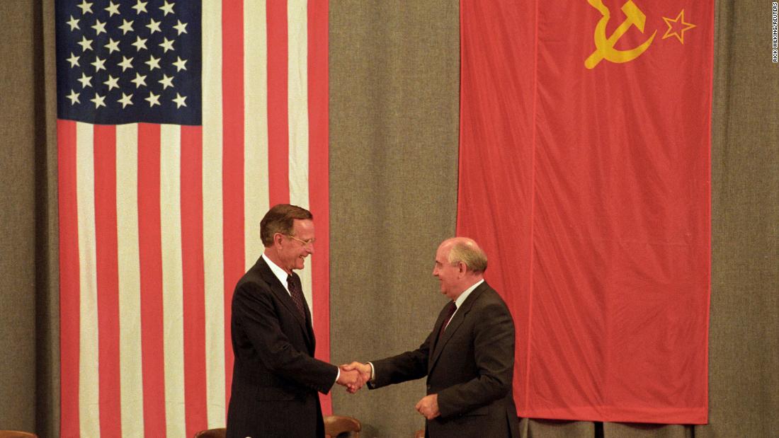 Bush and Gorbachev shake hands at the end of a news conference in Moscow in July 1991.