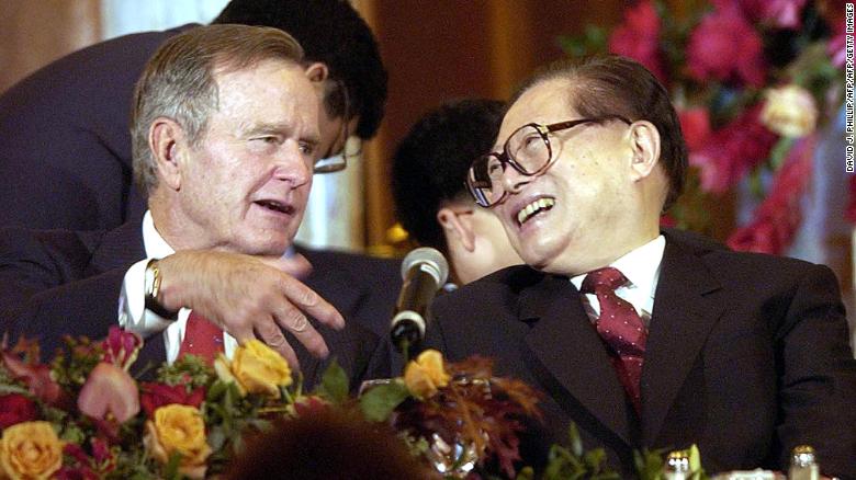 Former US President George Bush shares a laugh with then Chinese President Jiang Zemin in Houston, Texas, 23 October, 2002.