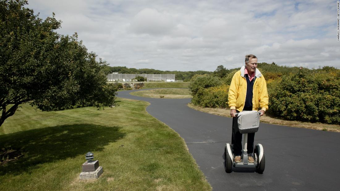 Bush rides a Segway at his home in Kennebunkport, Maine, in 2003.