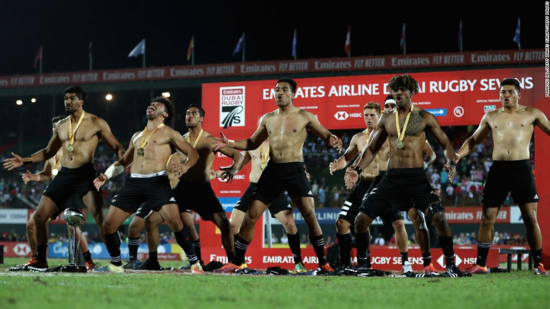 New Zealand players perform the haka after winning the Dubai Sevens title by defeating USA. 