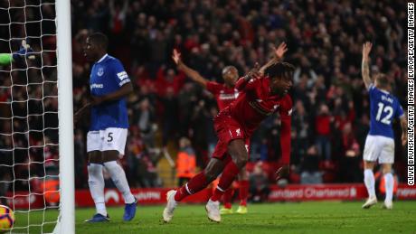 Liverpool's Divock Origi celebrates after scoring his team's only goal.