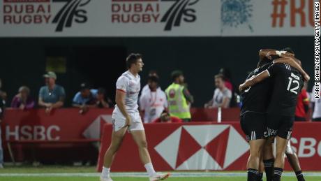 New Zealand players celebrate during the final of the Men's Sevens World Rugby Dubai Series Cup.