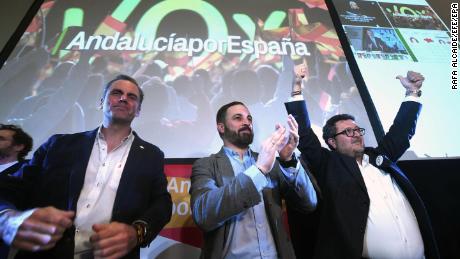 Vox candidate for Andalusian regional Presidency, magistrate Francisco Serrano (C), reacts during an election night party in Seville/.