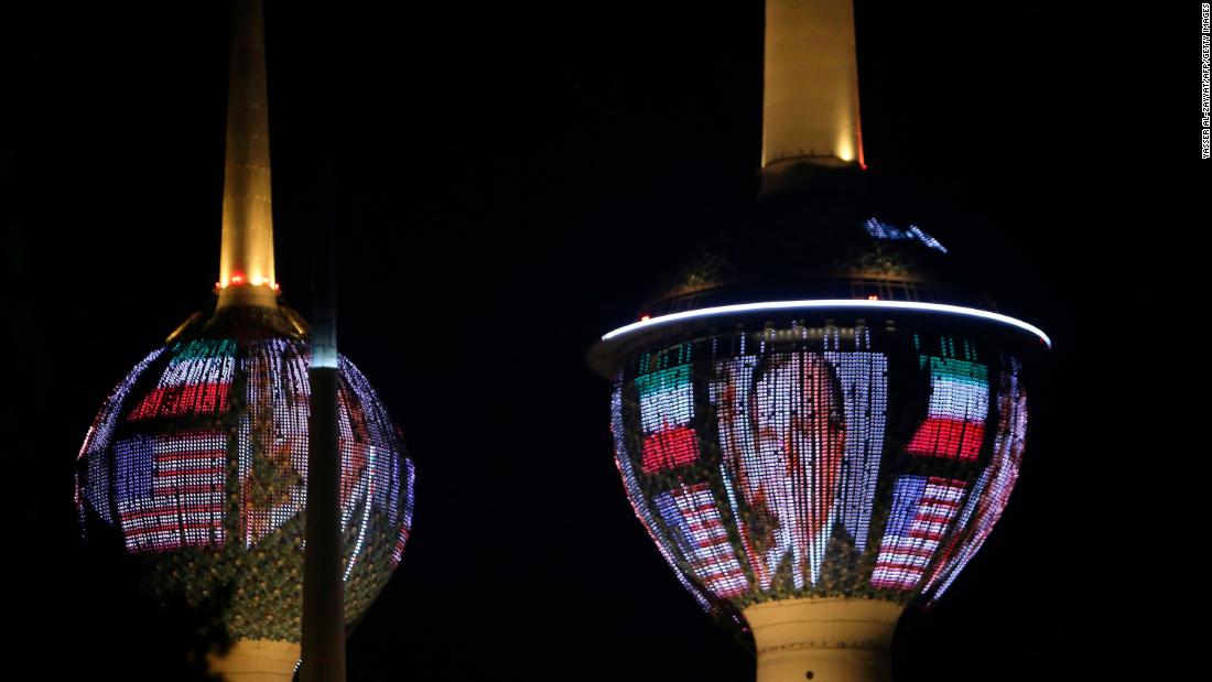 The Kuwait Towers in Kuwait City are illuminated with Bush&#39;s portrait and the colors of the American flag on December 1.
