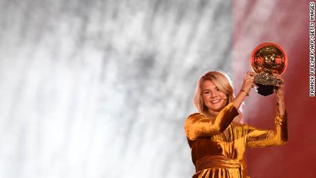 Hegerberg holds aloft her Balon d&#39;Or, received in Paris last December. 