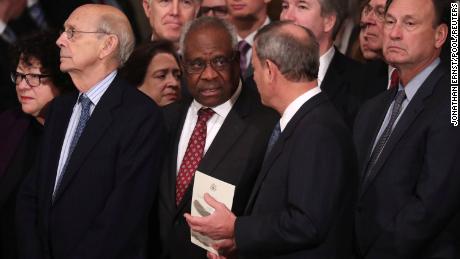 Thomas and other Supreme Court justices await the arrival of the casket of former President George H.W. Bush in the Capitol Rotunda on December 3, 2018. 