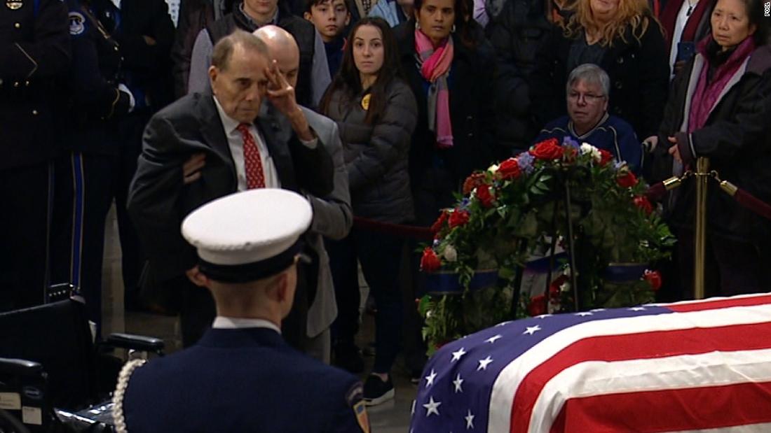 Bob Dole salutes Bush's casket - CNN Video