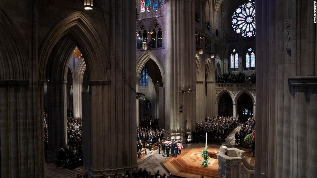 The late President&#39;s casket arrives at the National Cathedral in Washington.