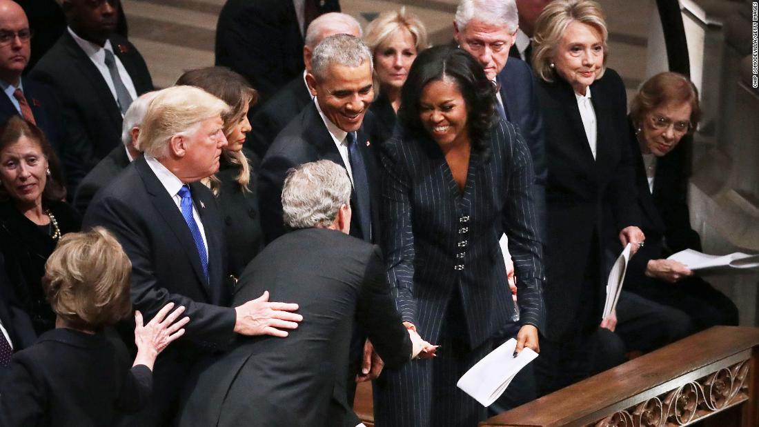 Michelle Obama and George W. Bush share a warm moment (and maybe a