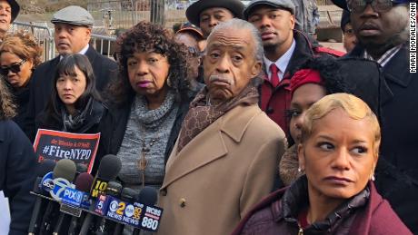 Eric Garner&#39;s mother, Gwen Carr, center, with the Rev. Al Sharpton and others after a disciplinary hearing for Daniel Pantaleo.