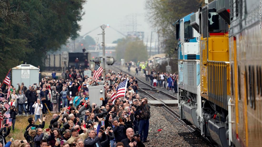 People line the train route to say goodbye to the former President.