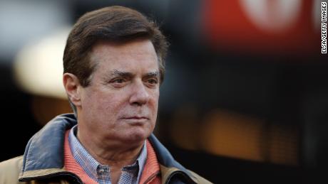 NEW YORK, NEW YORK - OCTOBER 17: Former Donald Trump presidential campaign manager Paul Manafort looks on during Game Four of the American League Championship Series at Yankee Stadium on October 17, 2017 in the Bronx borough of New York City. (Photo by Elsa/Getty Images)