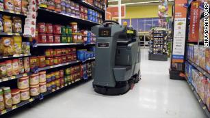 Walmart turns to robots and apps in stores