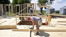 Contractors build wall frames during construction of a new Doug Phillips Construction Inc. home in Walnut, Illinois, U.S., on Wednesday, Aug. 1, 2018. The U.S. Census Bureau is scheduled to release housing starts figures on August 16. Photographer: Daniel Acker/Bloomberg via Getty Images