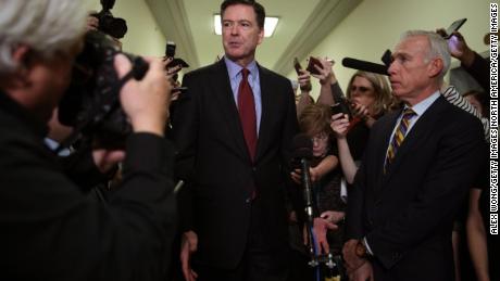 Former Federal Bureau of Investigation Director James Comey speaks to members of the media at the Rayburn House Office Building after testifying to the House Judiciary and Oversight and Government Reform committees on Capitol Hill December 07, 2018 in Washington, DC.