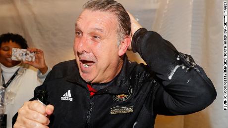 Atlanta coach Gerardo "Tata" Martino, post-champagne shower.