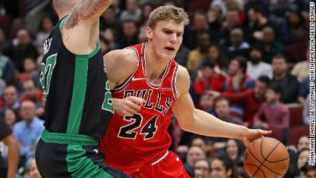 Chicago's Lauri Markkanen moves against the Celtics' Daniel Theis.