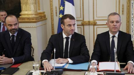 Prime Minister Edouard Philippe, President Emmanuel Macron and Ecology Minister François de Rugy meet with trade union leaders on Monday.