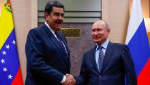 Russian President Vladimir Putin (R) shakes hands with his Venezuelan counterpart Nicolas Maduro during a meeting at the Novo-Ogaryovo state residence outside Moscow on December 5, 2018. (Photo by MAXIM SHEMETOV / POOL / AFP)        (Photo credit should read MAXIM SHEMETOV/AFP/Getty Images)