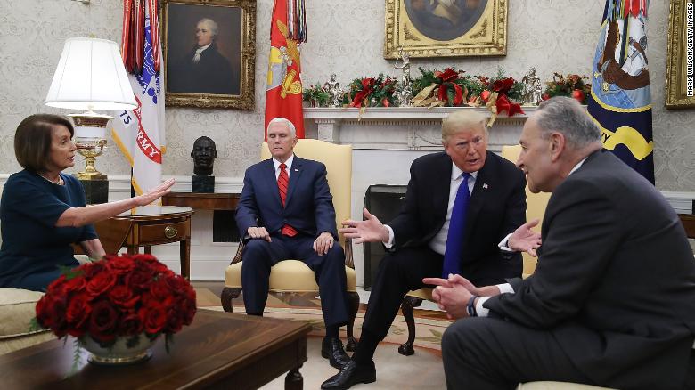 WASHINGTON, DC - DECEMBER 11: U.S. President Donald Trump (2R) talks about border security with Senate Minority Leader Chuck Schumer (D-NY) (R) and House Minority Leader Nancy Pelosi (D-CA) as Vice President Mike Pence sits nearby in the Oval Office on December 11, 2018 in Washington, DC. (Photo by Mark Wilson/Getty Images)