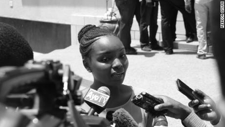 Rebeca Gyumi speaks to reporters after opening the case to challenge the Law of Marriage Act in 2016.