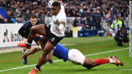 Fiji wing Josua Tuisova heads for the tryline against France.