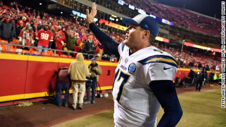 Chargers quarterback Philip Rivers waves to Kansas City Chiefs fans after his team defeated the Chiefs at Arrowhead Stadium.