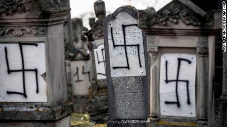 Tombstones in the Herrlisheim Jewish cemetery, north of Strasbourg, France, were spray-painted with swastikas.