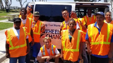 San Diego teen Kevin Barber (center) poses with his &quot;Wheels of Change&quot; crew.