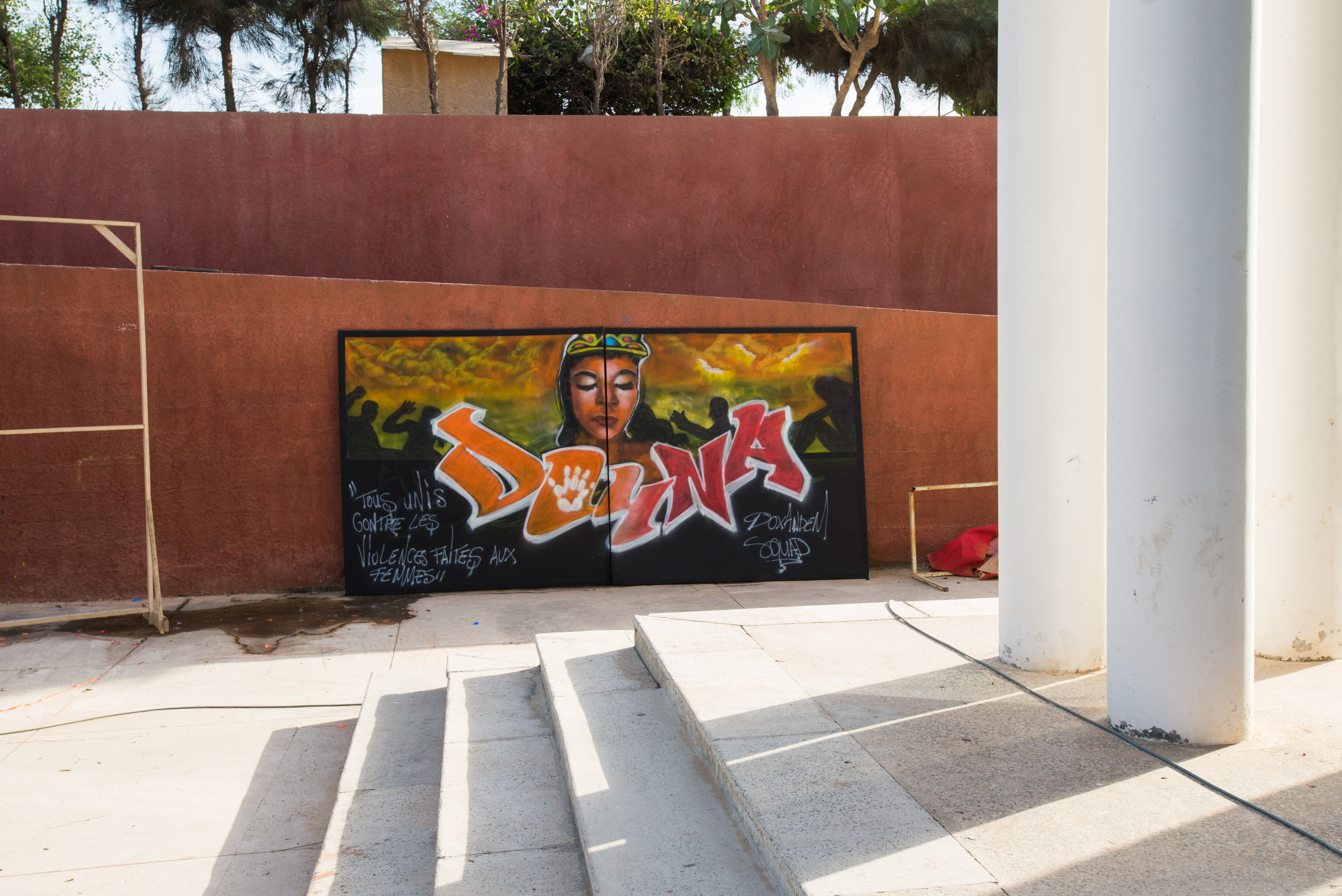 A sign with the word &quot;Doyna,&quot; or &quot;that&#39;s enough&quot; in Wolof, is seen behind the Henriett-Bathily Women&#39;s Museum in Dakar.  