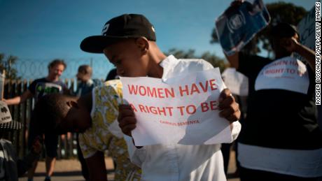 A boy takes part in a "walk a mile in her shoes" march protesting violence against women in Gugulethu in 2016. 