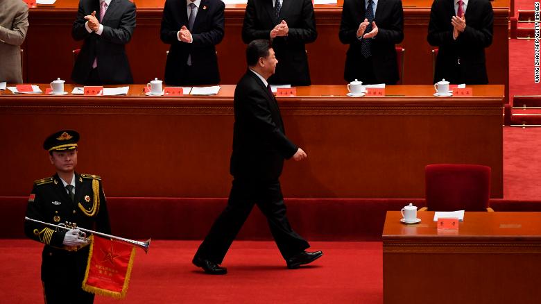 China&#39;s President Xi Jinping arrives for a celebration meeting marking the 40th anniversary of China&#39;s reform and opening up in Beijing on December 18.