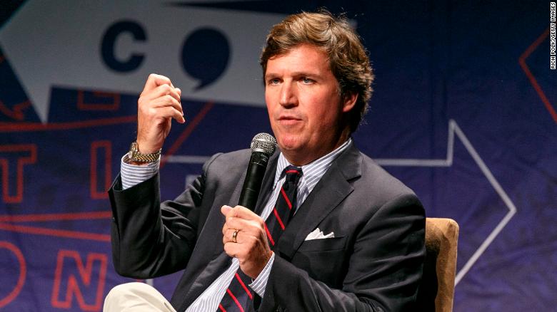 LOS ANGELES, CA - OCTOBER 21:  Tucker Carlson speaks onstage during Politicon 2018 at Los Angeles Convention Center on October 21, 2018 in Los Angeles, California.  (Photo by Rich Polk/Getty Images for Politicon )