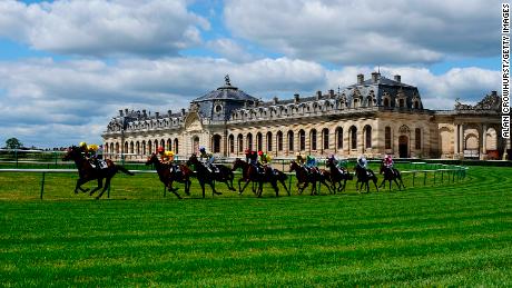 Chantilly racecourse features views of a chateau and the famous Great Stables (pictured).