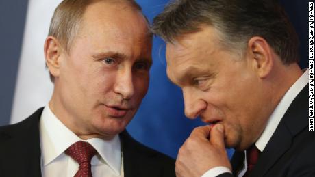 Viktor Orban (R) is seen as Vladimir Putin&#39;s closest ally in the EU. 
