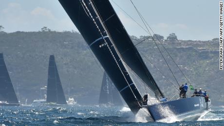 Australian supermaxi Black Jack led the 85-strong fleet out of Sydney Harbor at the start of the 74th staging of the Sydney to Hobart yacht race on Boxing Day. 