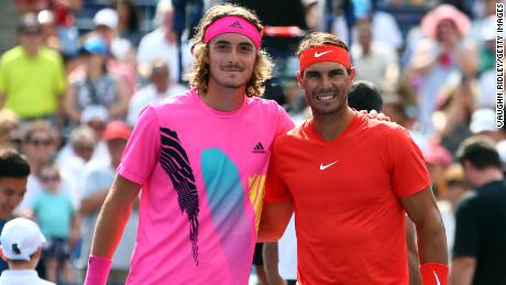 Rafael Nadal (right) poses with Greece&#39;s rising star Stefanos Tsitsipas, 20.