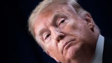 US President Donald Trump listens during a signing ceremony for the Agriculture Improvement Act of 2018  on December 20, 2019 in Washington, DC. (Photo by Brendan Smialowski / AFP)        (Photo credit should read BRENDAN SMIALOWSKI/AFP/Getty Images)