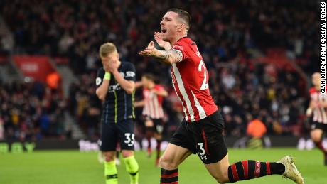 Manchester City's Oleksandr Zinchenko has his head in his hands after his mistake led to the equalizer from Southampton's Danish midfielder Pierre-Emile Hojbjerg.