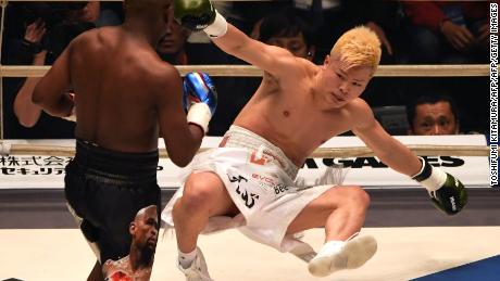 US boxing legend Floyd Mayweather Jr knocks down Japanese opponent Tenshin Nasukawa in their exhibition bout in Saitama on New Year's Eve.