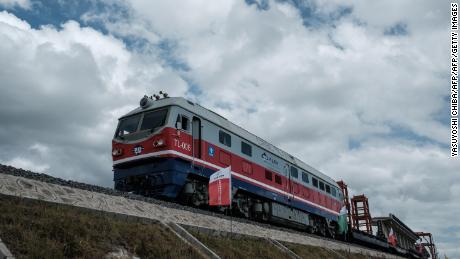 A rail link between the Kenyan cities of Mombasa and Nairobi has been a boon to passengers, but critics say it cost too much and leaves the country exposed to China. 