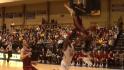 Basketball player blocks shot, slams into backboard